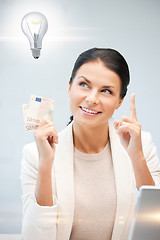 Image showing woman with cash euro money and light bulb