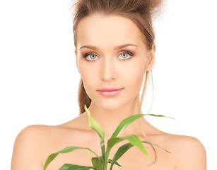 Image showing woman with green sprout