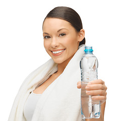 Image showing woman with towel and bottle of water