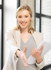 Image showing woman with an open hand ready for handshake