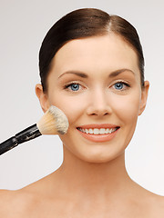 Image showing beautiful woman with brush