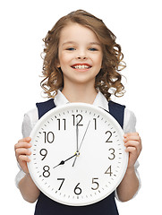 Image showing girl with big clock