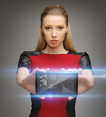 Image showing futuristic woman with tablet pc