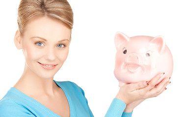 Image showing lovely woman with big piggy bank