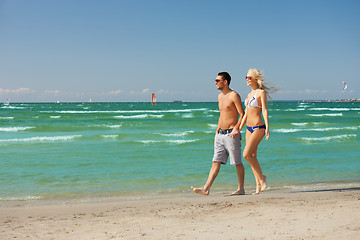 Image showing couple walking on the beach