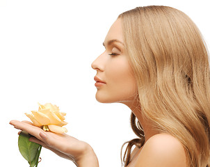Image showing lovely woman with rose flower