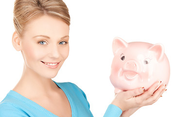 Image showing lovely woman with big piggy bank