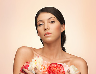 Image showing relaxed woman with flowers