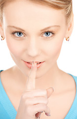 Image showing woman with finger on her lips