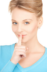 Image showing woman with finger on her lips