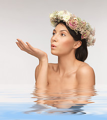 Image showing woman wearing wreath of flowers