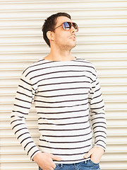 Image showing handsome man in casual clothes  wearing sunglasses