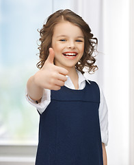 Image showing pre-teen girl showing thumbs up