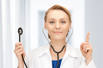 Image showing attractive female doctor with stethoscope