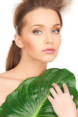 Image showing woman with green leaf