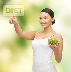 Image showing healthy woman holding bowl with salad