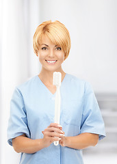 Image showing doctor with toothbrush