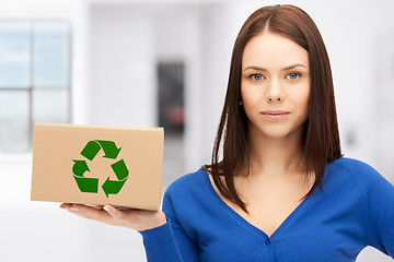 Image showing attractive businesswoman with recyclable box