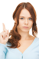 Image showing woman with finger up