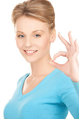 Image showing young woman showing ok sign