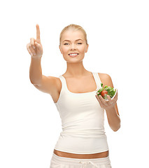 Image showing healthy woman holding bowl with salad