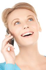 Image showing businesswoman with cell phone calling