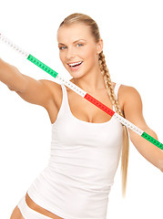 Image showing young beautiful woman with measure tape