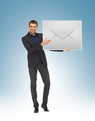 Image showing man showing virtual envelope