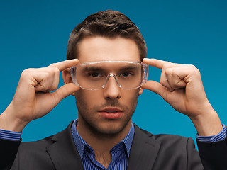 Image showing businessman in protective glasses