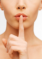 Image showing woman making a hush gesture