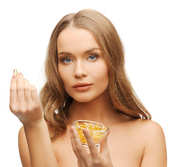 Image showing woman with vitamins