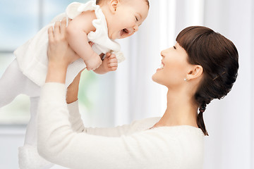 Image showing happy mother with adorable baby