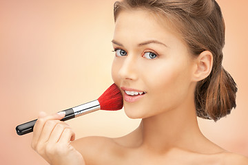 Image showing beautiful woman with brush