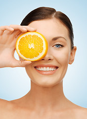 Image showing woman with orange slice
