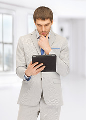 Image showing calm man with tablet pc computer