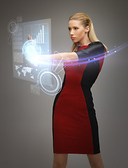 Image showing woman working with virtual touchscreens