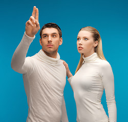 Image showing man and woman working with something imaginary