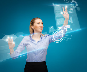 Image showing woman working with virtual screens