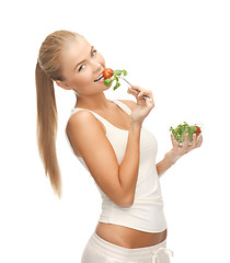 Image showing healthy woman holding bowl with salad