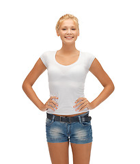 Image showing smiling teenage girl in blank white t-shirt