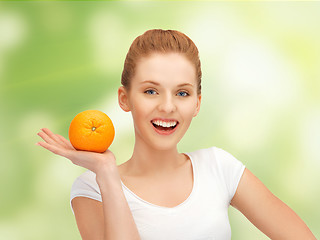 Image showing teenage girl with orange