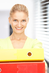 Image showing businesswoman with folders