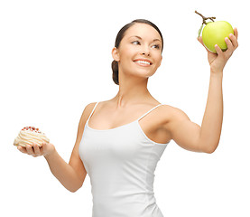 Image showing woman with cake and apple