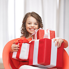 Image showing girl with gift boxes