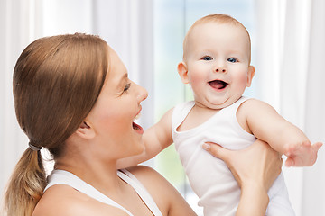 Image showing happy mother with adorable baby