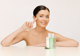 Image showing beautiful woman with moisturizing creme drop