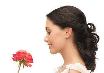 Image showing young and beautiful woman with flower