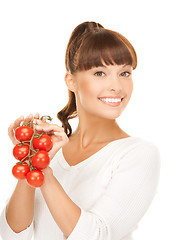 Image showing beautiful woman with shiny tomatoes