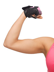 Image showing sporty woman flexing her biceps