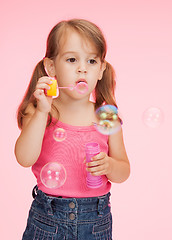 Image showing litle girl with soap bubbles